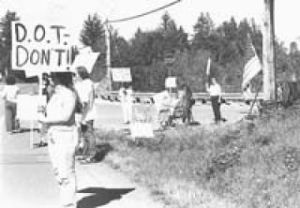 Dozens gather to save memorial cross