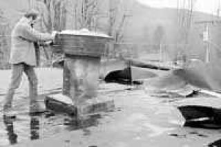 Winds damage building