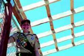 Eagle Scout project keeps baseball players dry