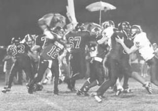 Red Wolves wear mud mask to homecoming dance