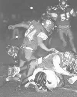 `Cats pull out defensive struggle