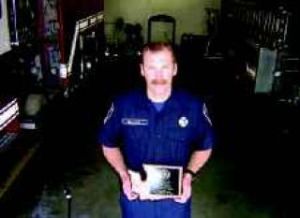 Volunteer firefighter a top student at academy