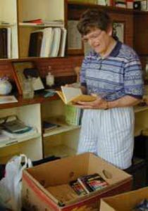 Methodist pastor hangs up her robes