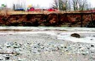 River erosion threatens road