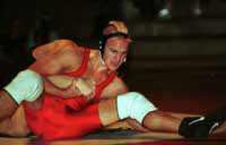 Wildcat grapplers squeak