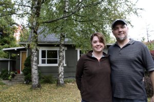 Cathy and Todd Gamble stand outside their Snoqualmie home