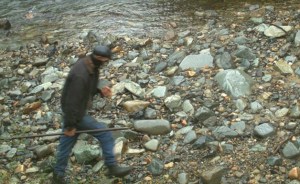 The person of interest in the theft of nine wildlife cameras is pictured in this image taken by a hidden WSDOT camera.