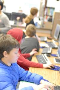 Students in Betsy Sorenson’s class work on assignments in the portable classroom’. The room is cozy