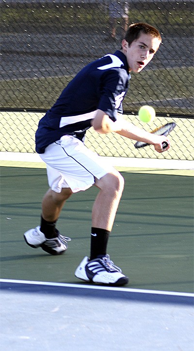 Mount Si freshman Camden Foucht returns a volley from his Interlake opponent