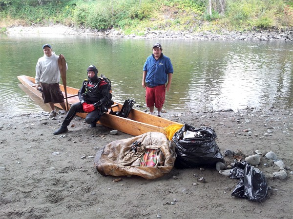 Diver Charles Frederick found his share of trash at the bottom of the river. Frederick had help throughout the day from Damian Moses