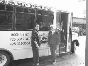 Snoqualmie Tribe member Kanim Ventura and Tribal Administrator Matt Mattson catch the Tribes new Snoqualmie Valley Transportation Shuttle on its first day of service. The Tribes new van is helping assist the local senior center fleet through a federal grant.