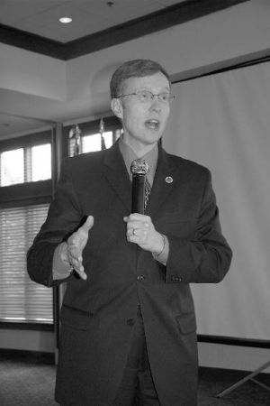 Washington State Attorney General Rob McKenna addresses the Snoqualmie Valley Chamber of Commerce during its luncheon Friday