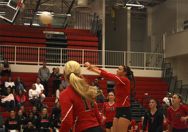 Mount Si's Anna McCreadie hits a ball toward the Patriots during Wednesday's third match. Mount Si sharpened its focus to battle and overcome two early-night losses and win.