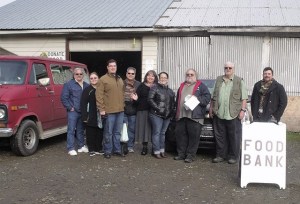 Making a donation of vehicles to the Carnation Public Food Bank Nov. 18