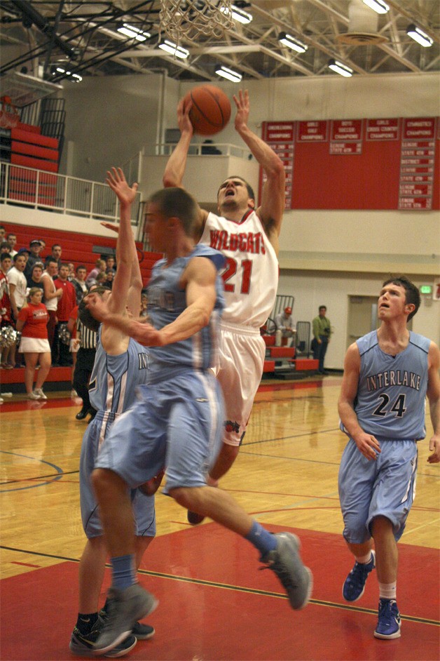 Mount Si's Trent Riley goes up for an attempt at the basket in the second half of the Wildcats' home win over Interlake on Dec. 18. Riley