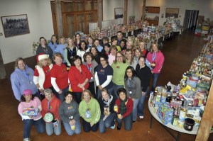 Thirty-four Encompass staff and one former board member gather Thursday