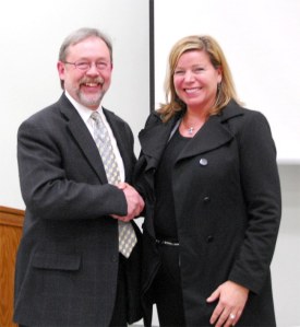 North Bend Mayor Ken Hearing congratulates newly hired North Bend City Administrator Londi Lindell.
