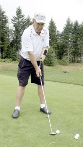 North Bend resident Ed Wilson readies a shot during the Boeing Classic Adaptive Golf Clinic. Wilson