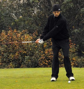 Mount Si's Sebastian Gant winds up to tee off at Eagle's Talon during district play.
