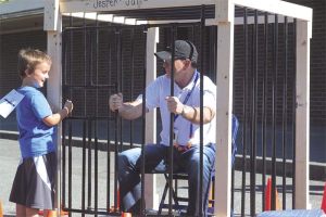 Opstad Elementary School principal John Jester spent part of the school’s walk-athon going directly to jail. The Monopoly-themed event raised money a variety of ways