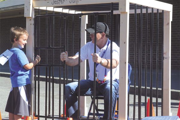 Opstad Elementary School principal John Jester spent part of the school’s walk-athon going directly to jail. The Monopoly-themed event raised money a variety of ways