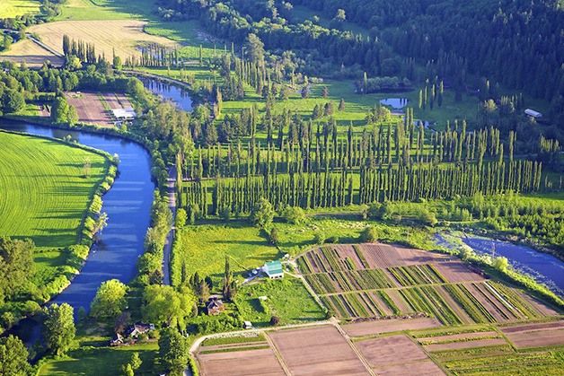 The Snoqualmie River curves by Jubilee Farm near Carnation in this view from Carnation-based aerial photographer Gabhan Berry. He’s flown over the Valley