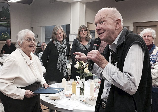 Ray Burhen singles out his wife Tove while telling of their many years and experiences with the Sno-Valley Senior Center.