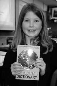 Third-grader Adele Werner is one of hundreds of Valley students to receive a free dictionary through the Kiwanis Club’s “Words for Thirds” program.