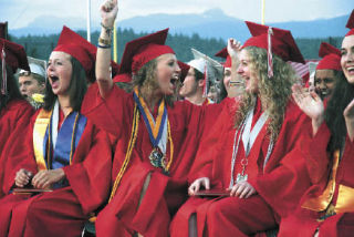 Salutatorian Gillian Kenagy (left) screams in excitement
