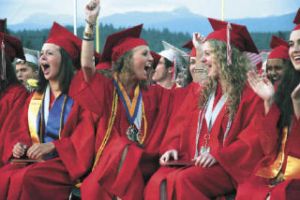 Salutatorian Gillian Kenagy (left) screams in excitement