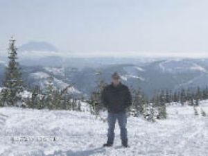 Snoqualmie resident Jeff Warren experiences a new kind of “spring” as he goes snowmobiling for the first time in the Cascades