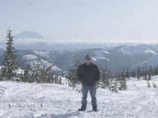 Snoqualmie resident Jeff Warren experiences a new kind of “spring” as he goes snowmobiling for the first time in the Cascades