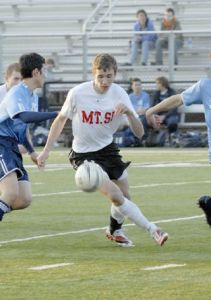 Adam Baumgardiner works the ball around an Interlake defender in last week’s 2-0 loss to the Saints. Losses in the second half of the season have nixed any hopes that Mount Si might make the playoffs.