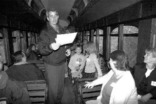 Snoqualmie Mayor Matt Larson reads a special proclamation of thanks to emergency training instructor Patricia Johnson