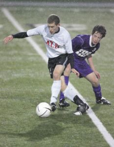 Mount Si High School’s Chad Hennig works his way around an Issaquah defender during last week’s 1-0 loss to the Eagles. The game ended the Wildcat’s promising but ultimately difficult season.