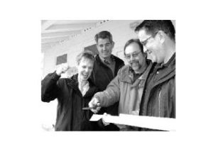 Mount Si Helping Hand Food Bank Director Gail Gergasko celebrates the completion of the food bank’s new expansion during a ribbon cutting Thursday