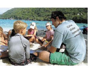 Mount Si grad Josh Breeds works to teach children of the Seychelles Islands about predators. He and fellow researchers on the Island