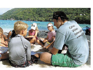 Mount Si grad Josh Breeds works to teach children of the Seychelles Islands about predators. He and fellow researchers on the Island
