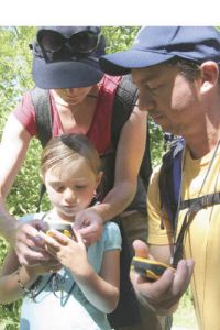 Sharon and Nick Matarangas help their daughter