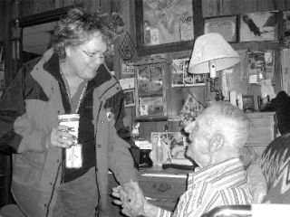 Red Cross volunteer Jeri Cranney makes a visit to a Snoqualmie resident during the November 2006 flooding.