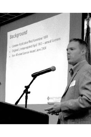 Joel Molander of Puget Sound Energy talks about the licensing effort underway at Snoqualmie Falls — which could mean big changes in the way the scenic waterfall and generating site will look — during a talk at the Snoqualmie Valley Chamber luncheon on Friday