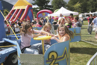 Enjoying a carnival ride at the Festival at Mount Si