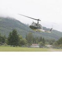 The King County Sheriff’s Guardian Two helicopter lands at Torguson Park in North Bend Thursday afternoon