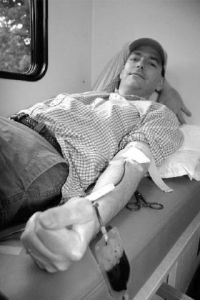 Snoqualmie resident Kirk Brandenburg gives of his needed O-negative blood during a Puget Sound Blood Center stop