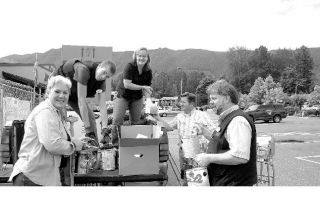 Loading up a truck with donated items to help Mamma’s Hands House of Hope shelter