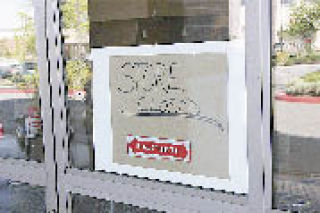 Shoppers found a closed sign on the door at Village Foods last weekend.