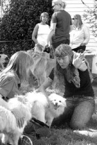 Rose De Dan gives a Peruvian Q’ero shamanic blessing to Fall City resident Jodi Lein’s dog Q-Tip