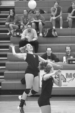 Miranda Pratt goes up for a kill during action against Bothell. Pratt set a new school record of 28 kills against Bothell