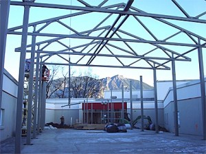 Steel trusses are hauled into place at the new Mount Si High School commons