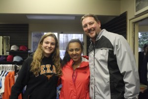 Evan Pappas/Staff PhotoCaptains Bianca Backman and Caitlin Maralack pose with their coach Steve Botulinksi at Mount Si Golf Course.